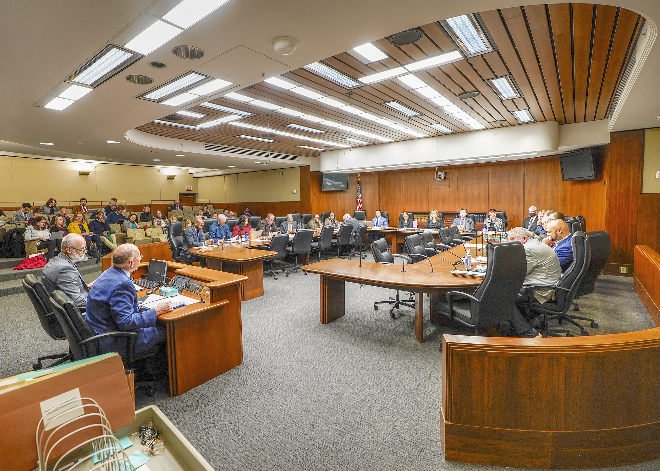 The House Public Safety Finance and Policy Committee receives testimony from state corrections and public safety officials April 16 during a presentation on the committee’s supplemental budget bill. (Photo by Andrew VonBank)
